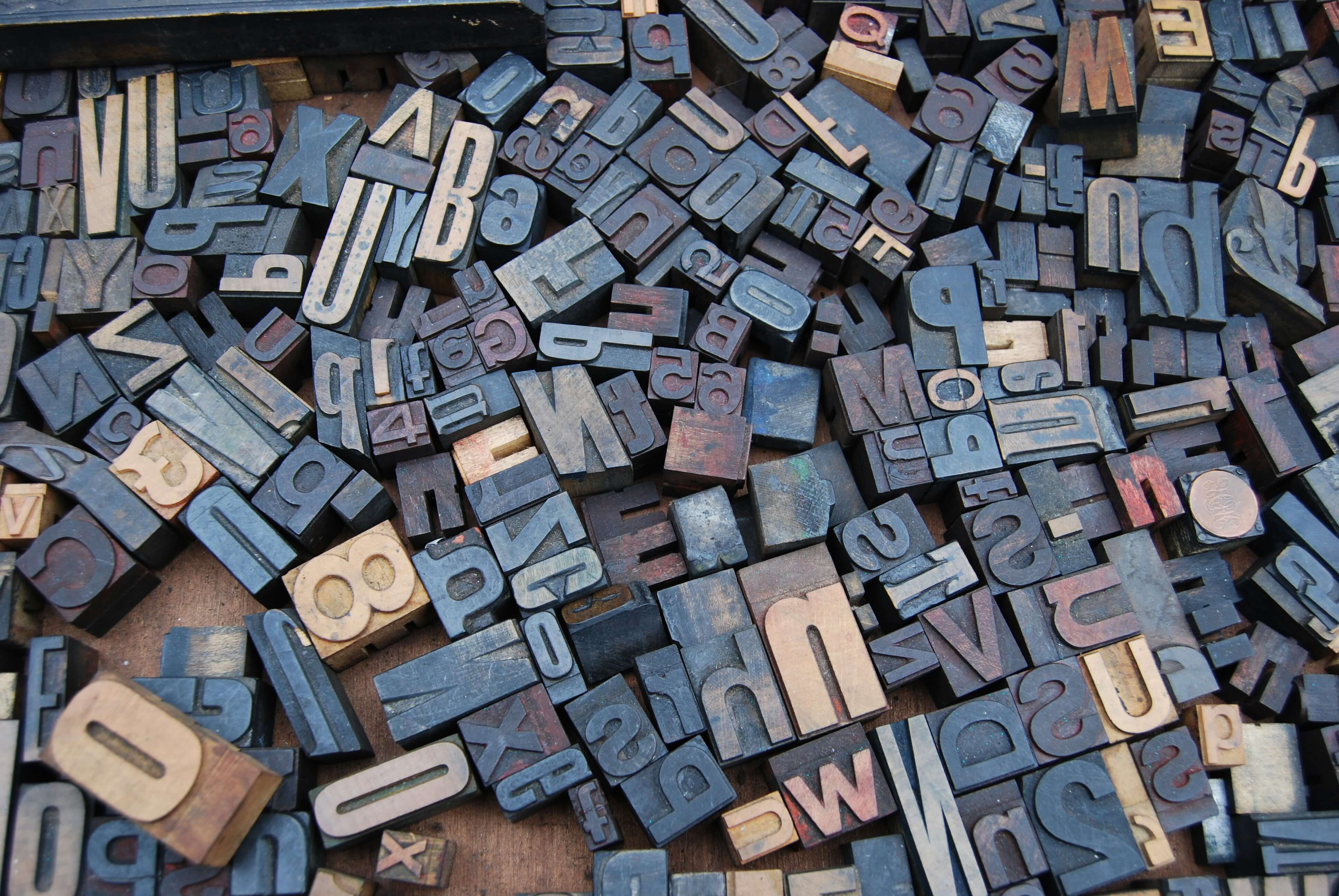 Wooden letter tiles spelling out words